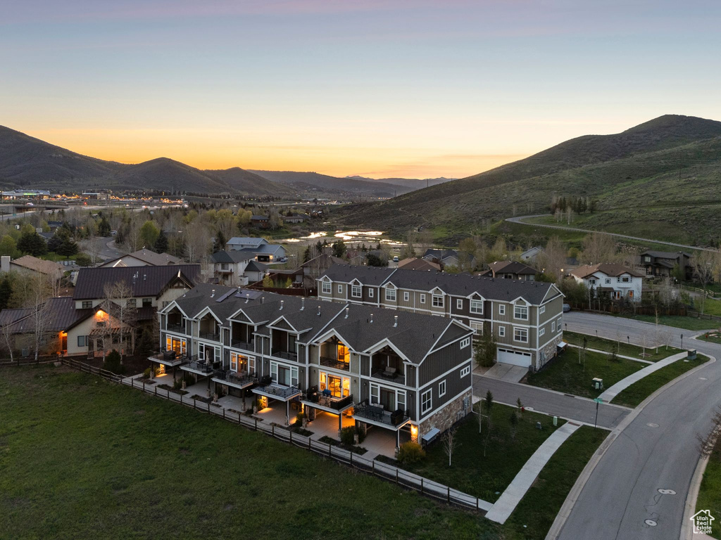 Aerial view at dusk of a mountain view and a residential view