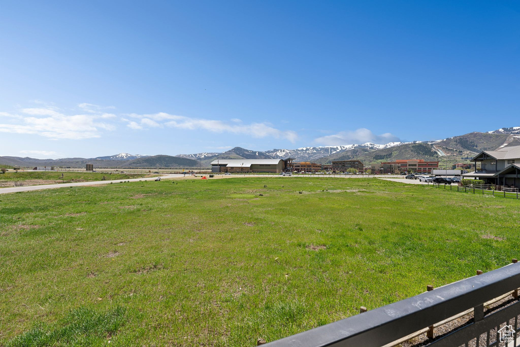 View of yard featuring a mountain view and a view of countryside