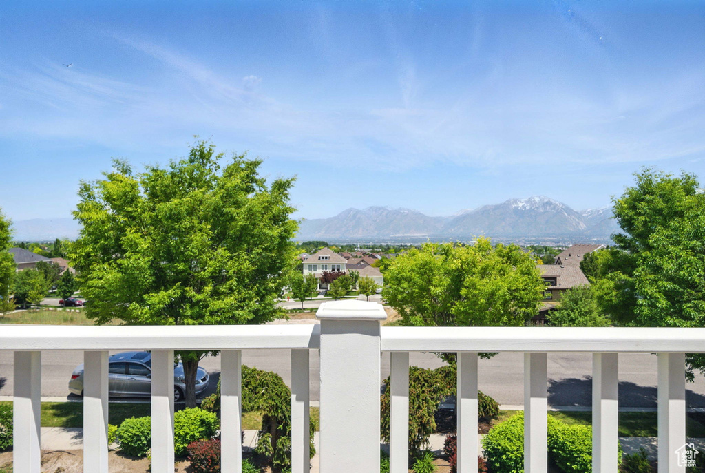 View of mountain backdrop featuring nearby suburban area