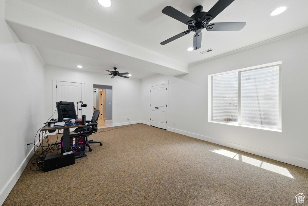 Carpeted office with ornamental molding, recessed lighting, baseboards, and a ceiling fan