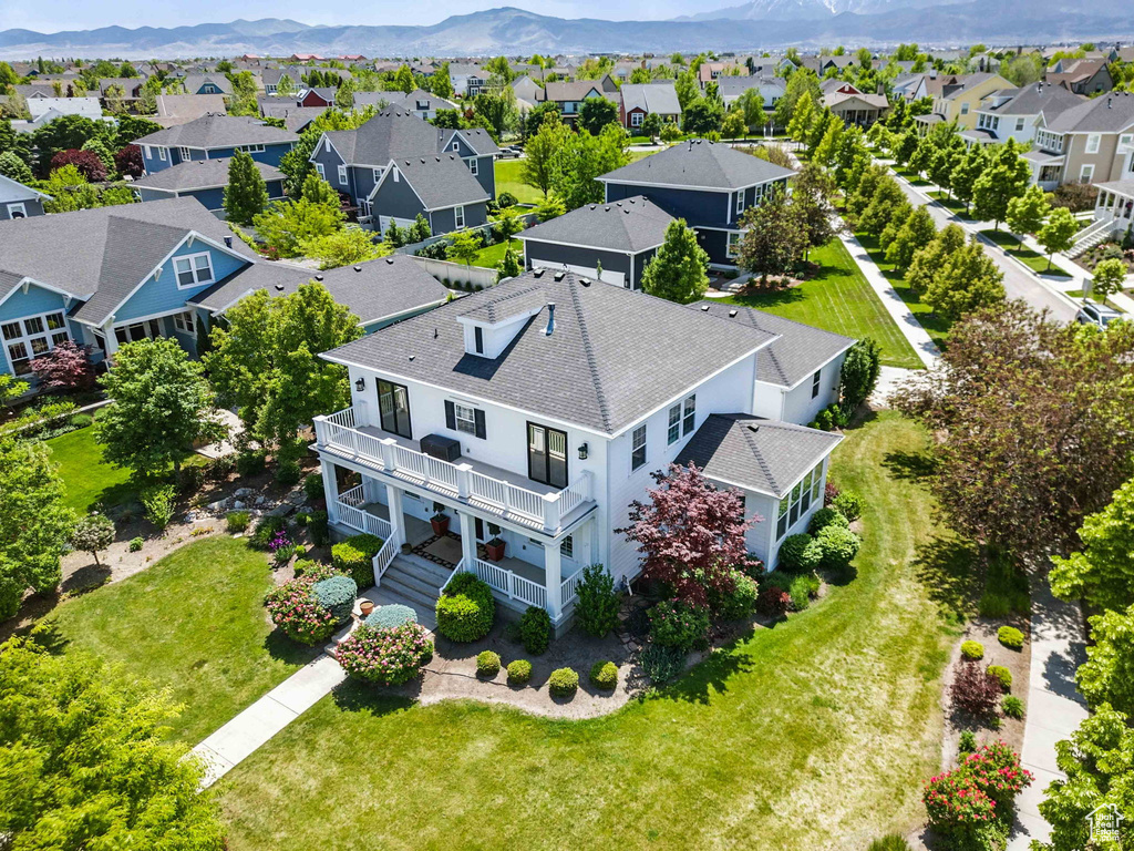 Aerial view of residential area with a mountainous background