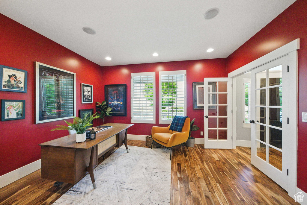 Office area with baseboards, wood finished floors, french doors, and recessed lighting