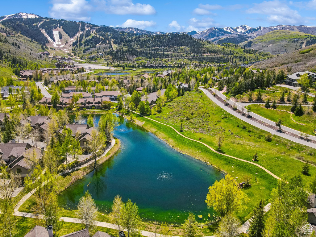Aerial view of residential area with a water and mountain view