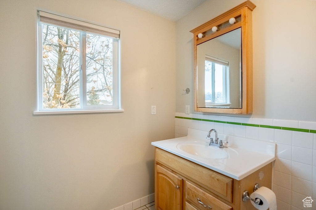Bathroom with vanity and plenty of natural light