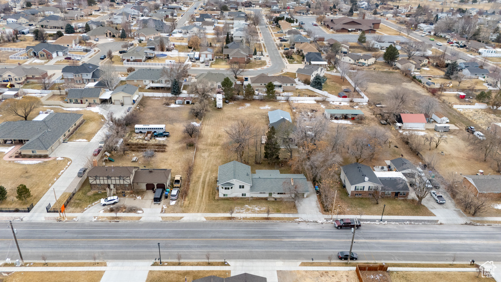 View of property location with nearby suburban area