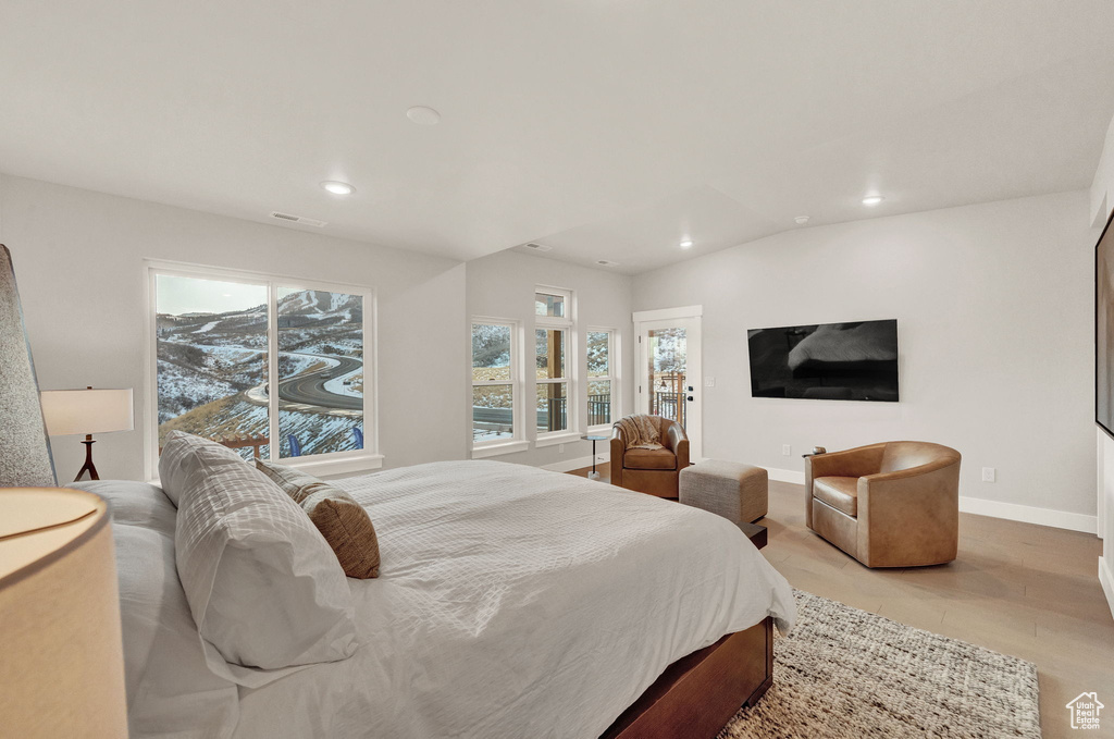 Bedroom featuring recessed lighting, baseboards, and light tile patterned floors