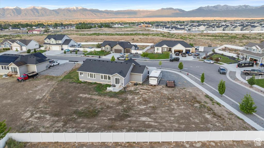 Aerial view of residential area with a mountain backdrop
