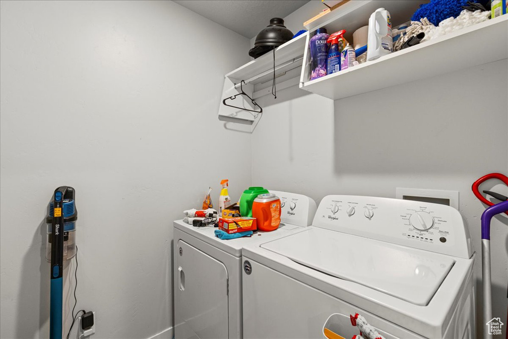 Laundry area featuring separate washer and dryer