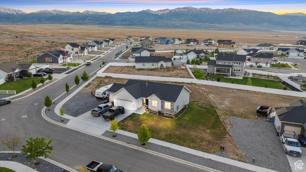 Aerial view of residential area with mountains