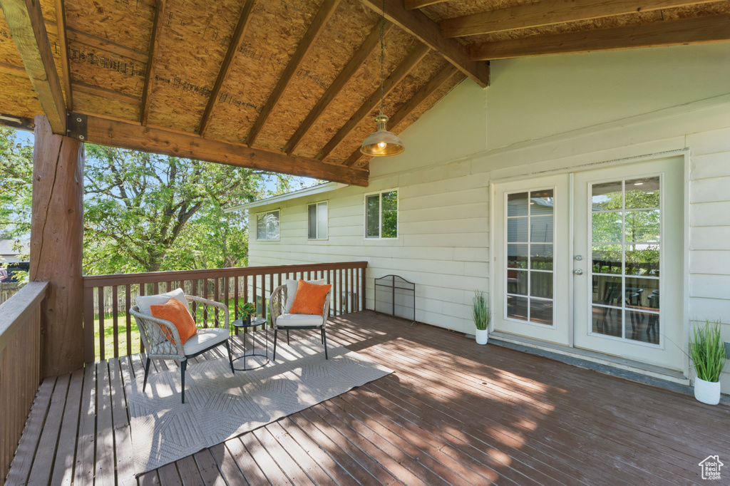 Wooden deck featuring french doors