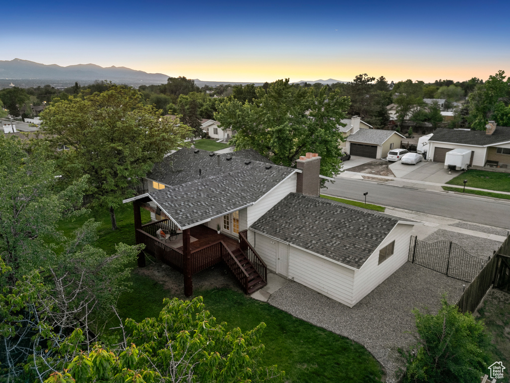 View of subject property featuring mountains