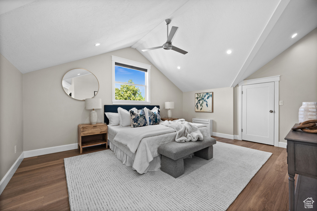 Bedroom featuring lofted ceiling, dark wood-style flooring, ceiling fan, baseboards, and recessed lighting