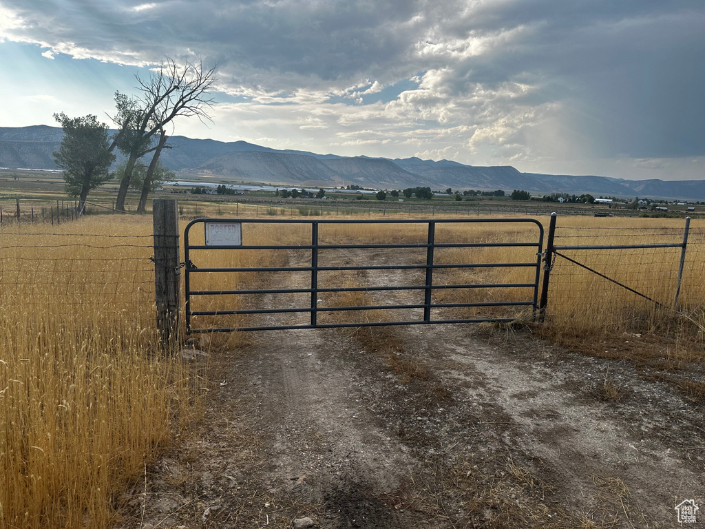 Gate with a view of countryside and a mountain view