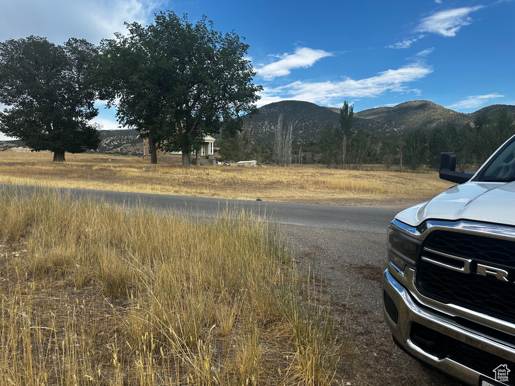 View of asphalt road featuring a mountain view
