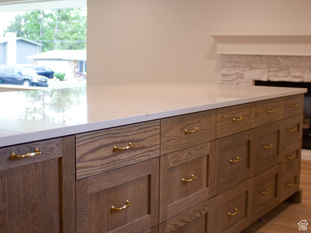Kitchen featuring light wood-style floors and light countertops