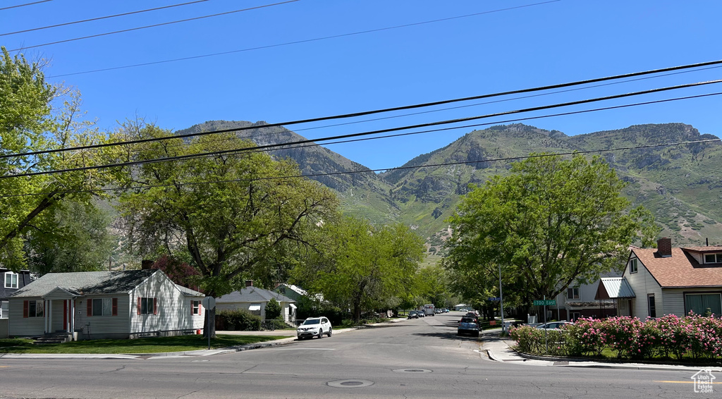 View of mountain background featuring nearby suburban area
