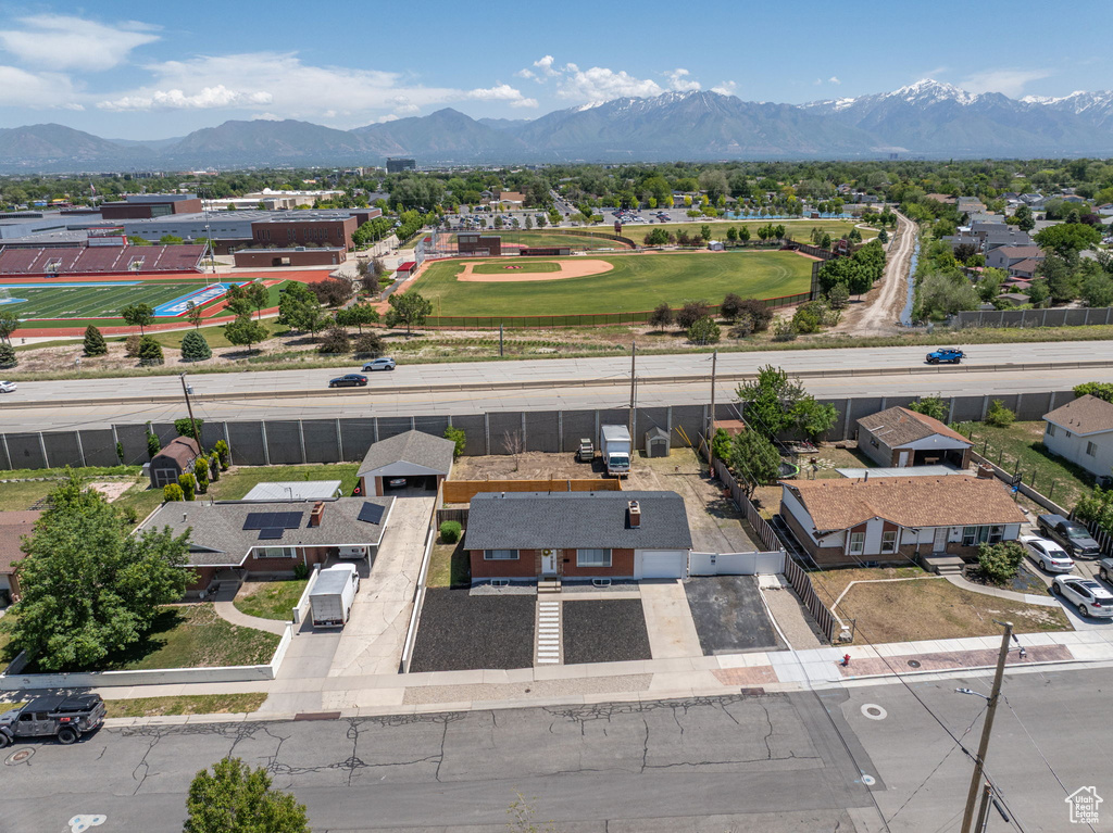 Aerial view of residential area with a mountainous background