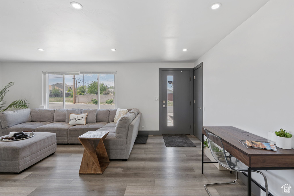 Living room featuring recessed lighting and wood finished floors