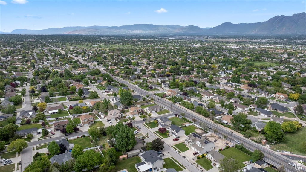 Aerial view of property's location featuring mountains