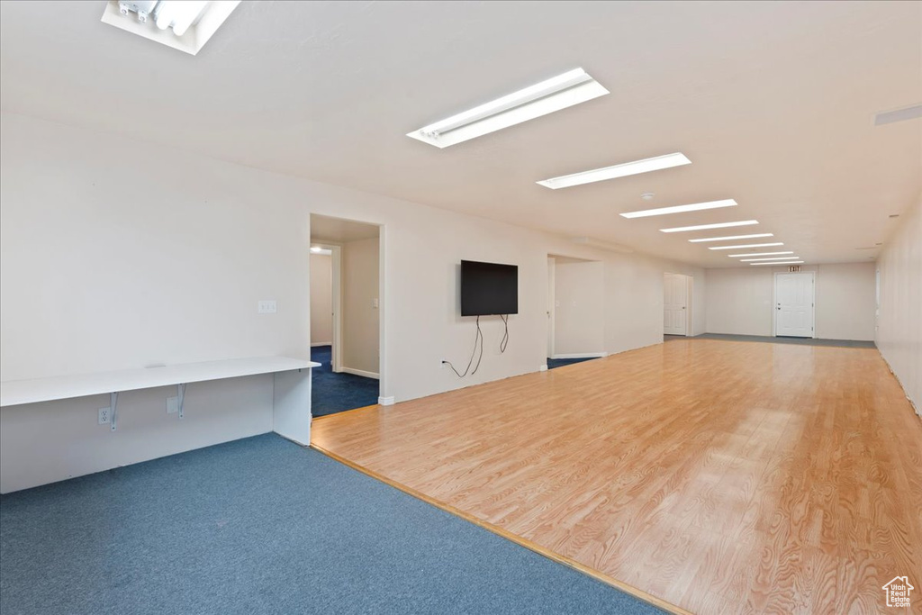 Spare room featuring wood finished floors