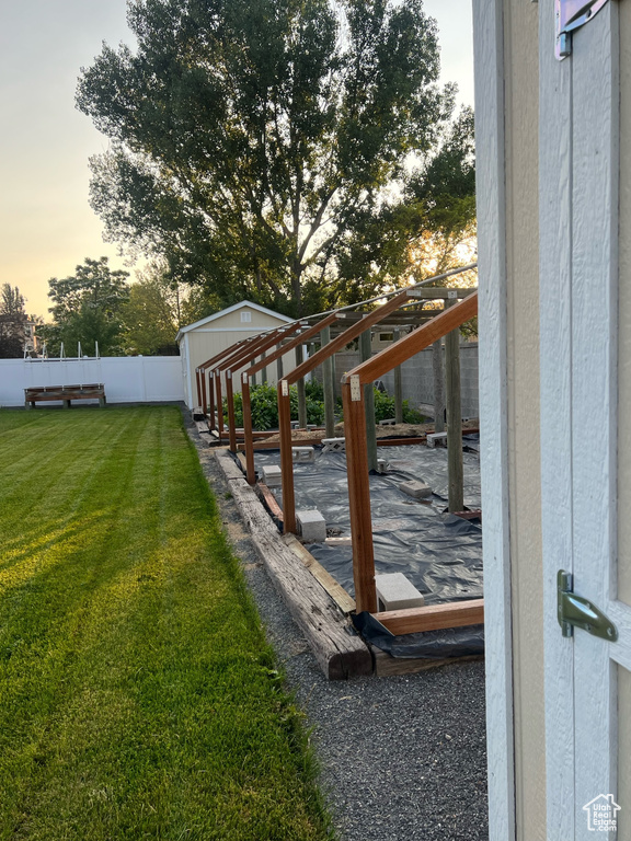 View of yard at dusk