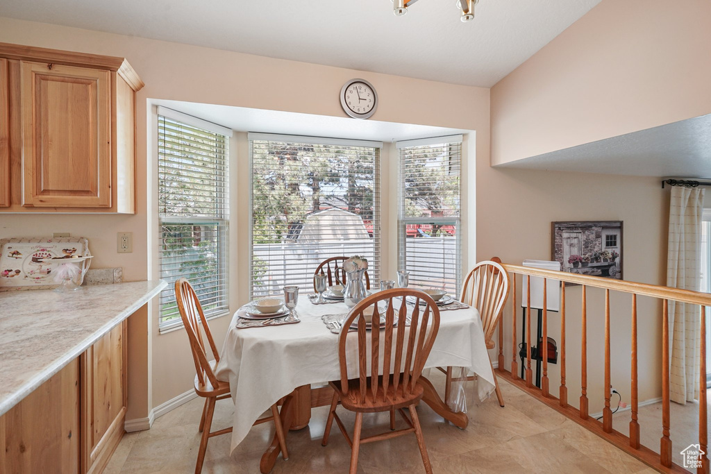 Dining room with plenty of natural light and baseboards
