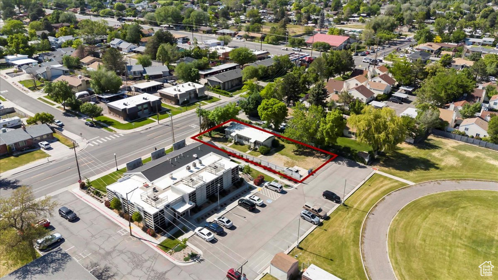 Aerial perspective of suburban area with property parcel outlined