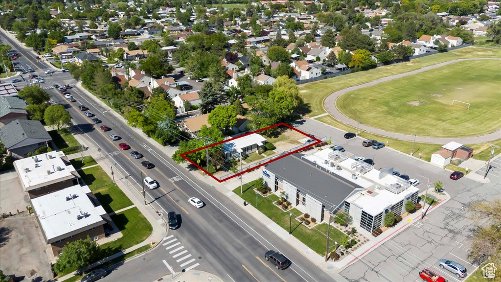 Aerial perspective of suburban area with property boundaries highlighted