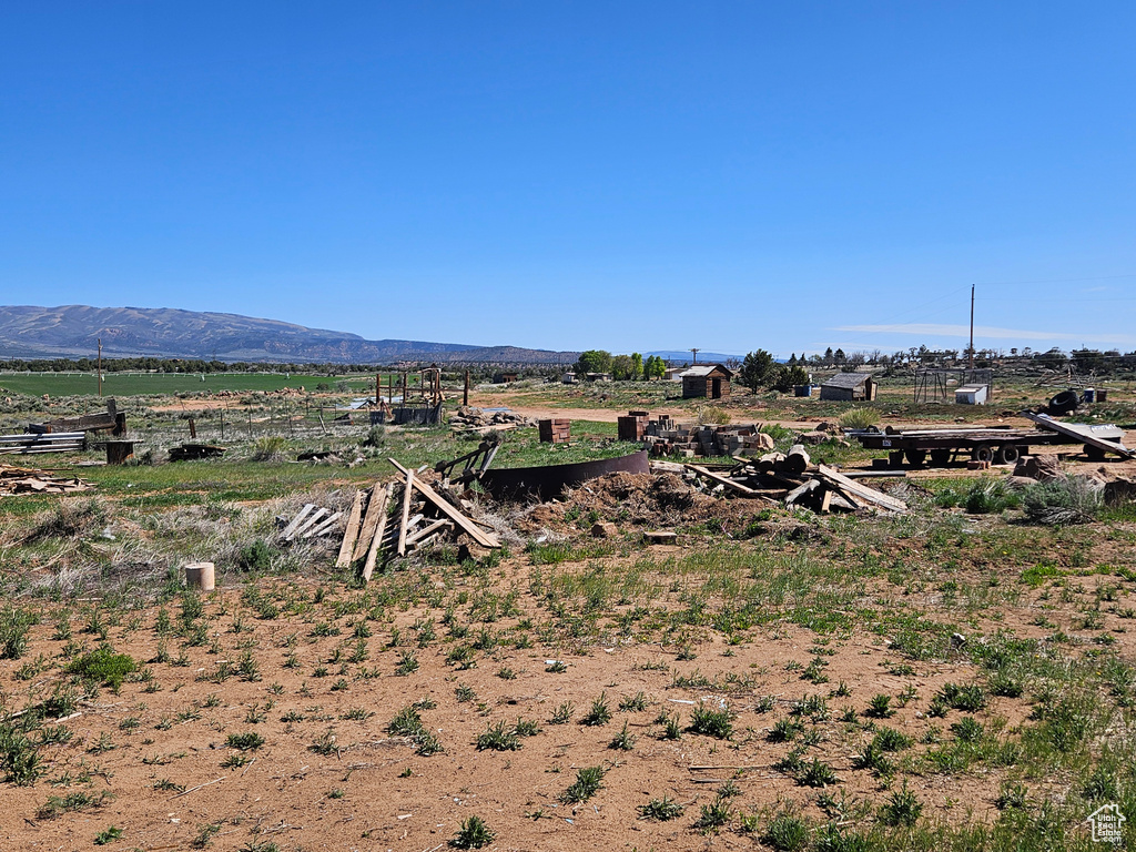View of yard featuring a view of countryside and a mountain view