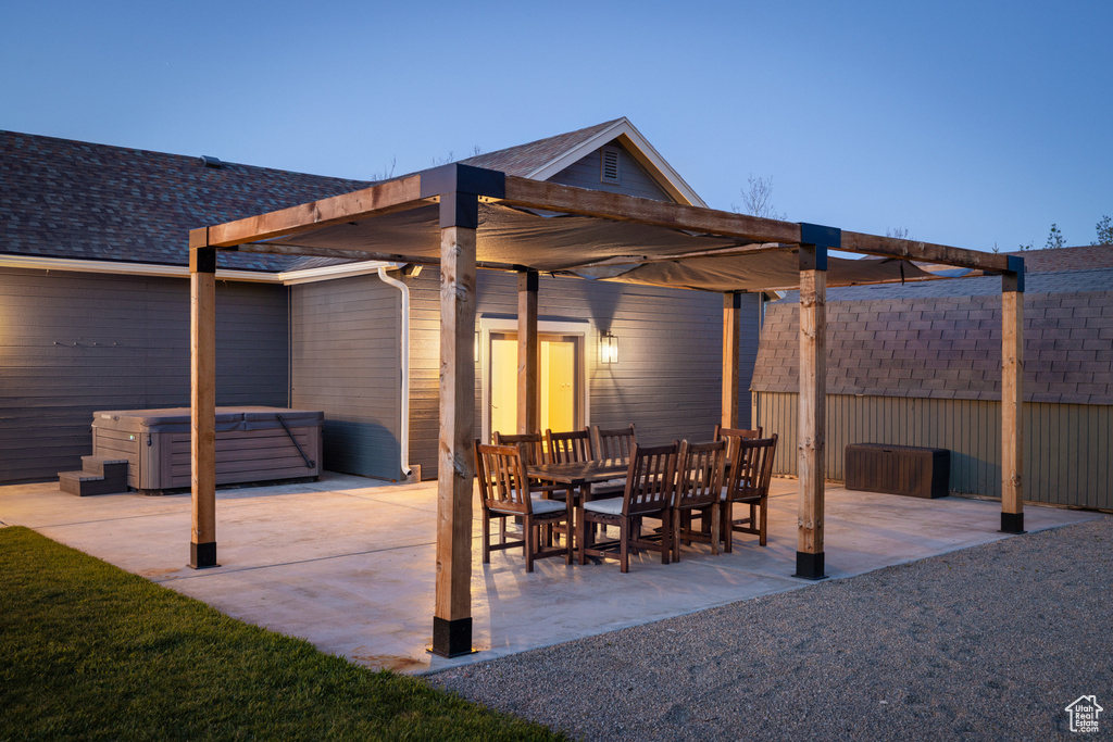 View of patio / terrace featuring a hot tub