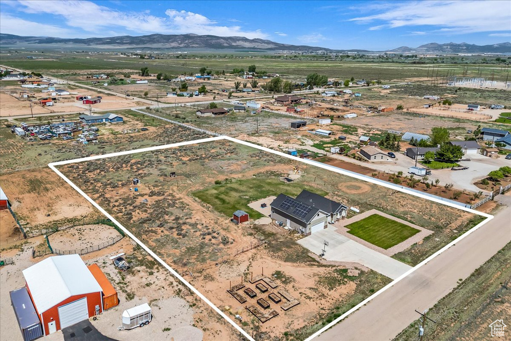 Aerial overview of property's location featuring mountains and property parcel outlined