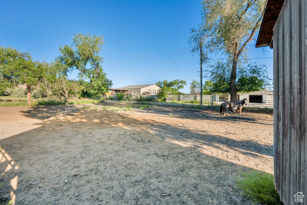 View of yard with an outbuilding and an exterior structure