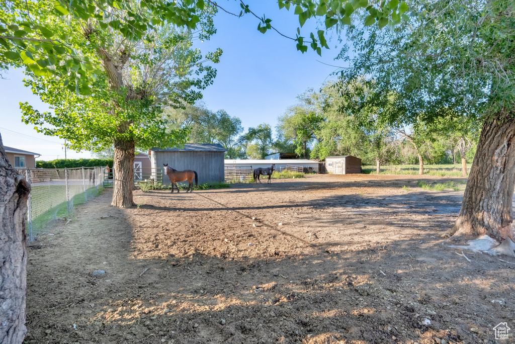 View of property\\\\\\\'s community with an outbuilding and an exterior structure