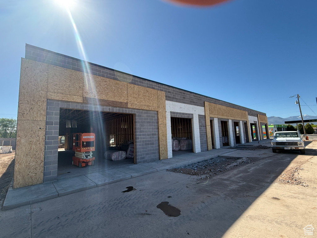 View of property with a garage
