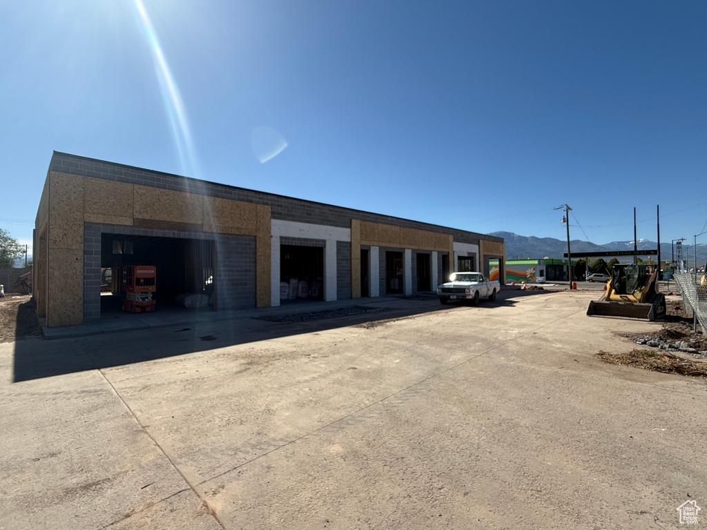 Garage featuring a mountain view