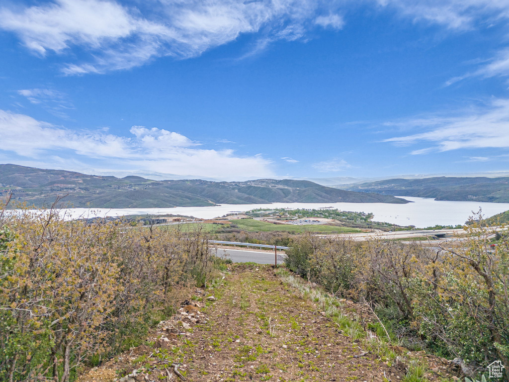 View of mountain backdrop with a nearby body of water