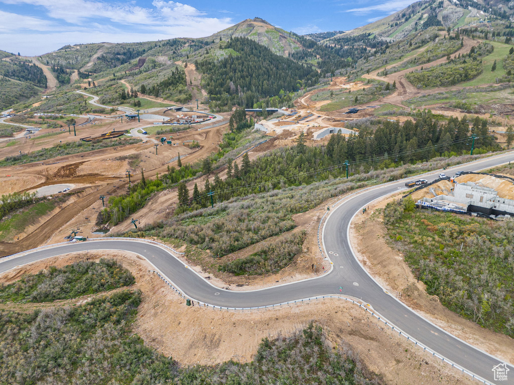 Aerial view of property's location with mountains