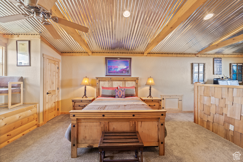 Bedroom with carpet floors, wooden ceiling, baseboards, and recessed lighting