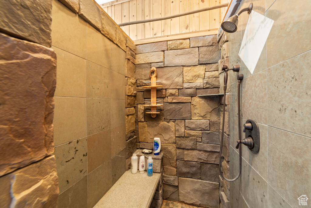 Bathroom view of a tile shower