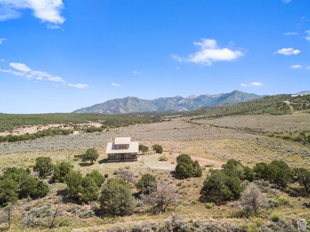 View of mountain backdrop featuring rural landscape