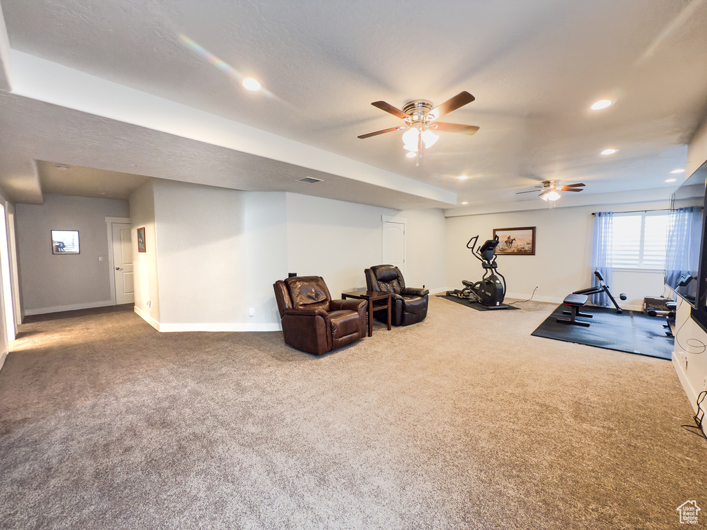 Workout area featuring baseboards, carpet, recessed lighting, and a ceiling fan