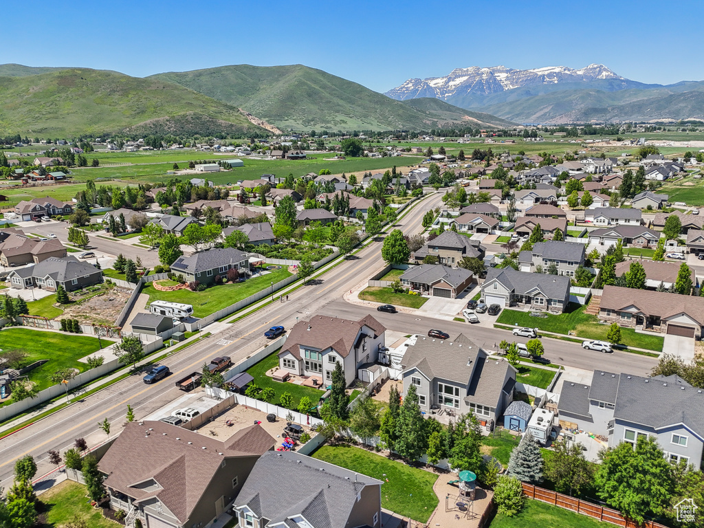 Aerial view of residential area with a mountainous background