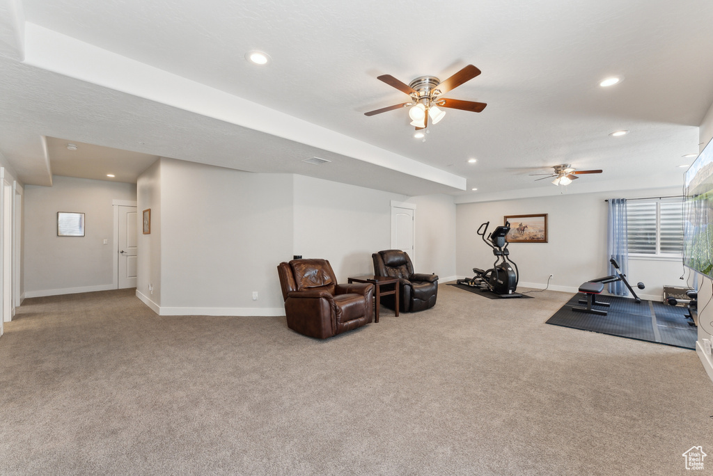 Workout area featuring carpet floors, baseboards, a ceiling fan, and recessed lighting