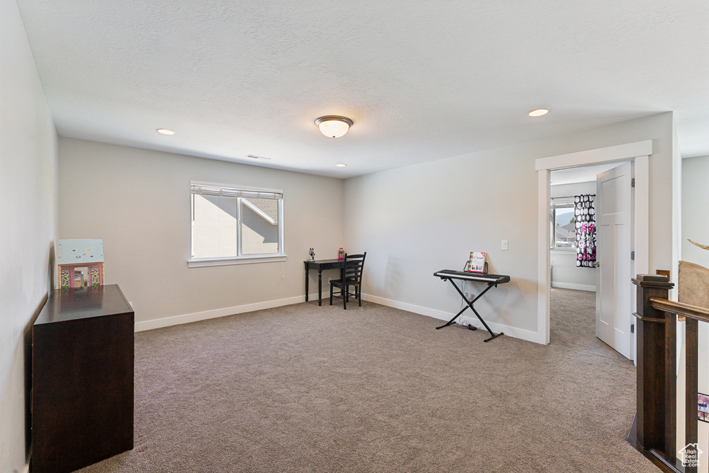 Miscellaneous room with carpet flooring, baseboards, and recessed lighting