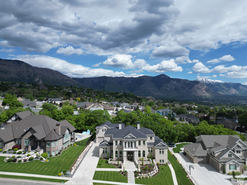 View of mountain background featuring nearby suburban area