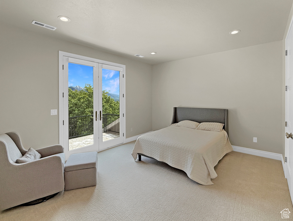 Bedroom with access to exterior, carpet floors, recessed lighting, and baseboards