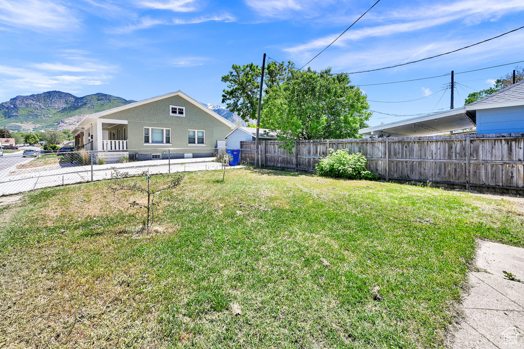 View of yard with a mountain view