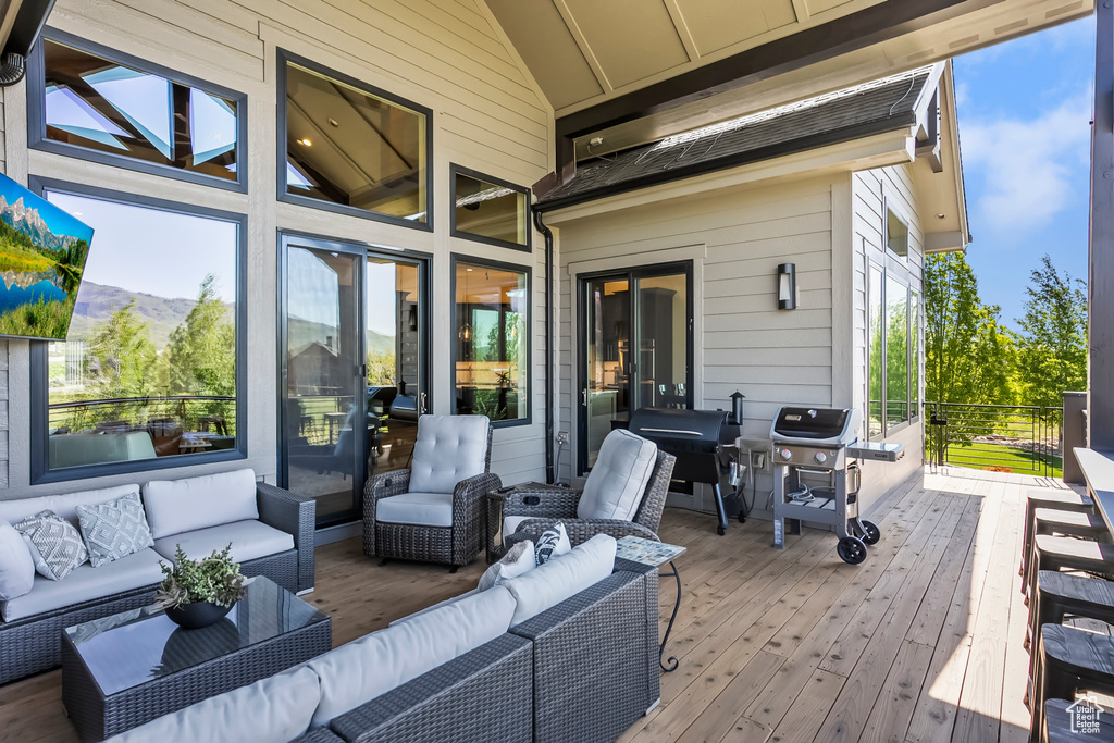 Wooden deck with outdoor lounge area