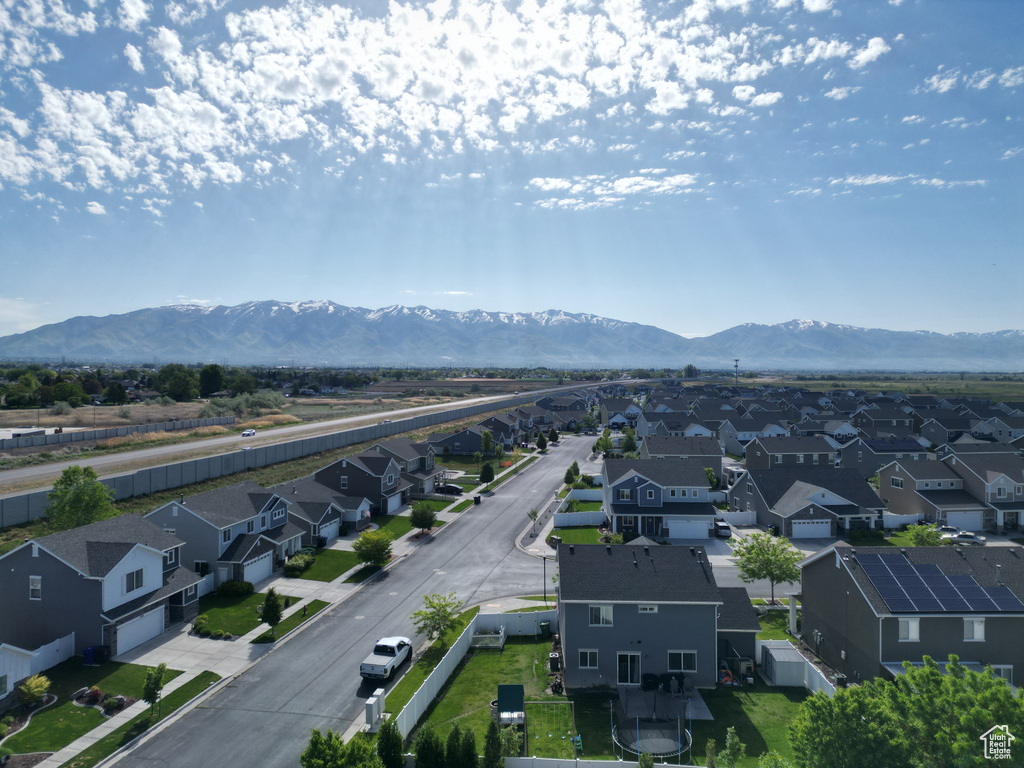 Aerial perspective of suburban area featuring mountains