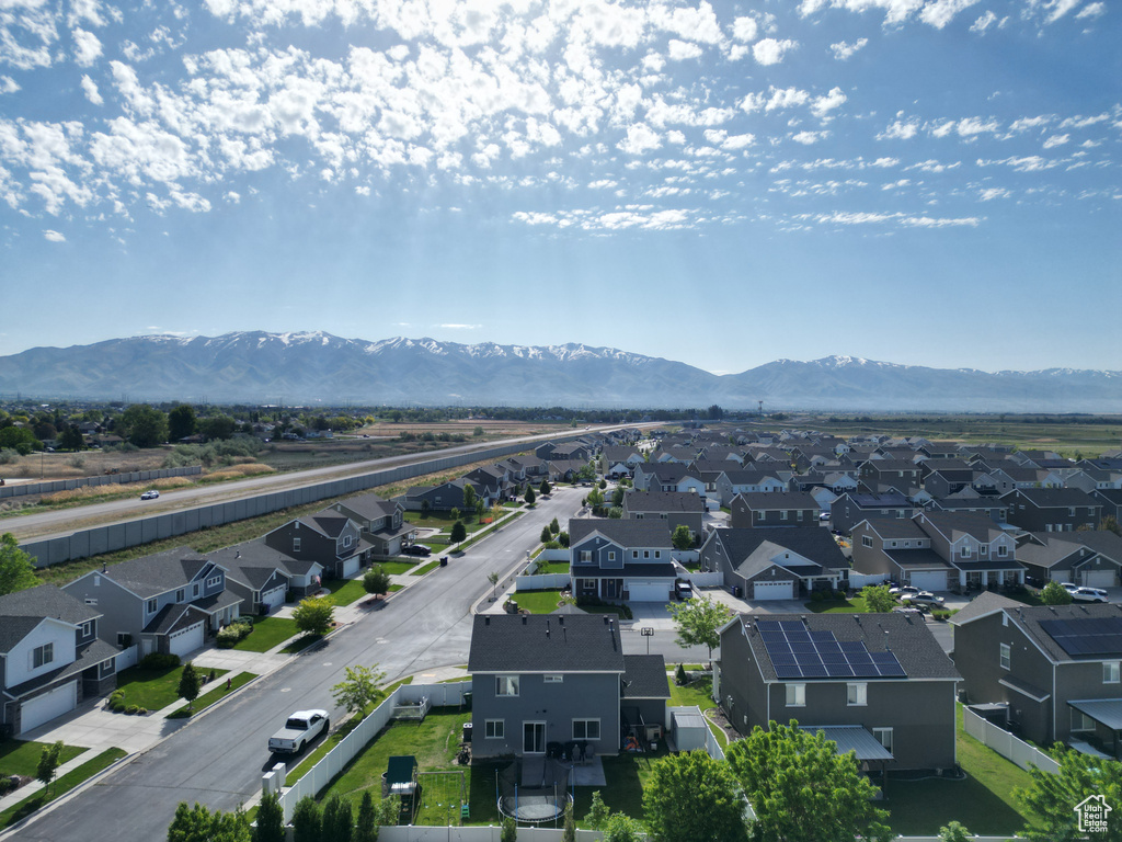 Aerial view of residential area with mountains